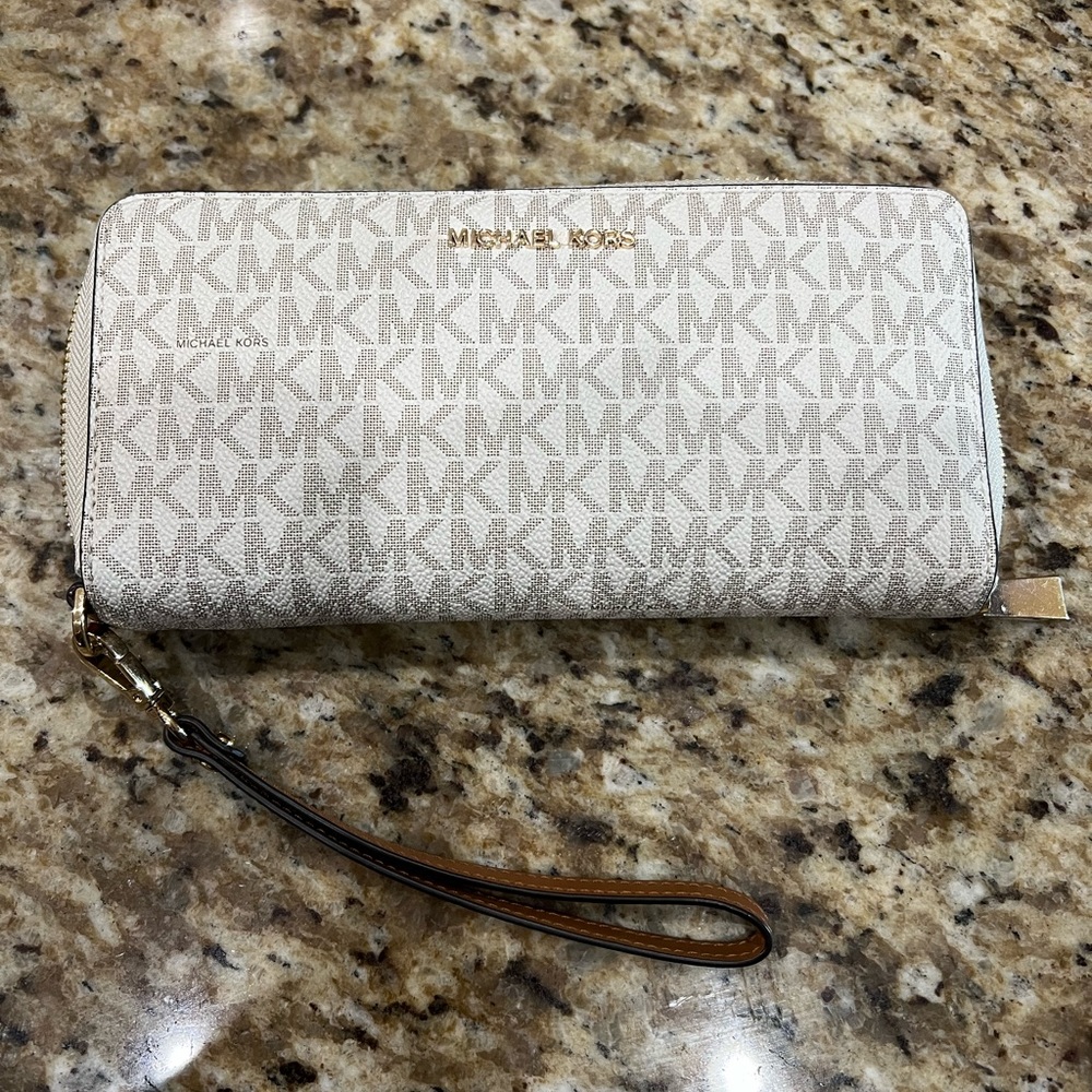 White and tan MK wallet